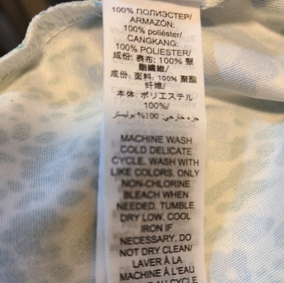 RINTED PERFORMANCE SLEEVELESS HALF-ZIP TOP - Picture 12 of 12